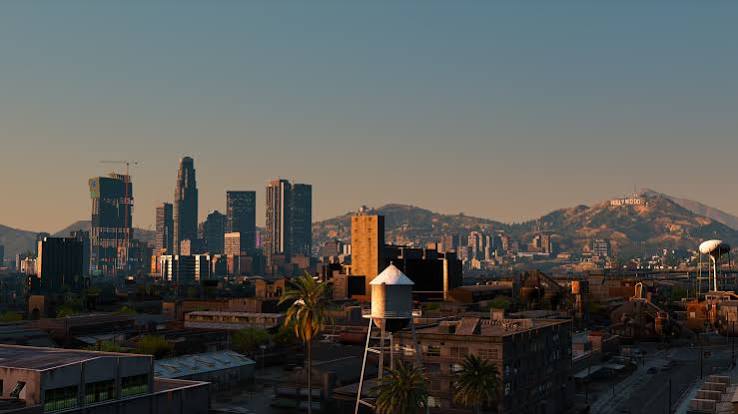Downtown skyline at dusk with the Vinewood sign